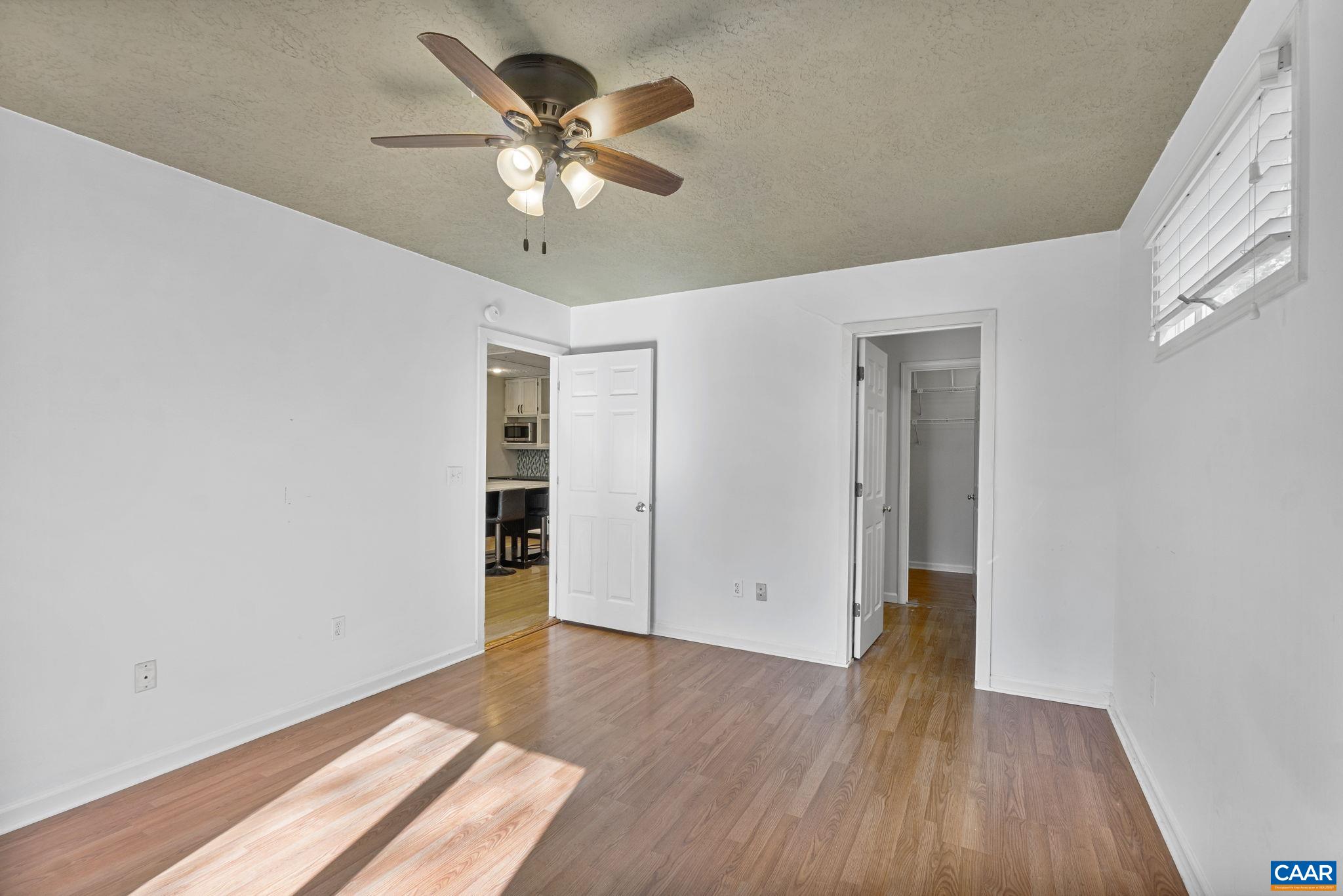 30 Colonial Road Palmyra, VA 22963 - Photo 15 of 30 wooden floor in an empty room with a window