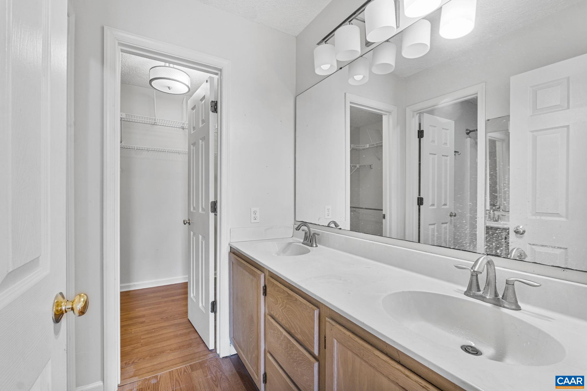 30 Colonial Road Palmyra, VA 22963 - Photo 16 of 30 a bathroom with a sink double vanity and a mirror