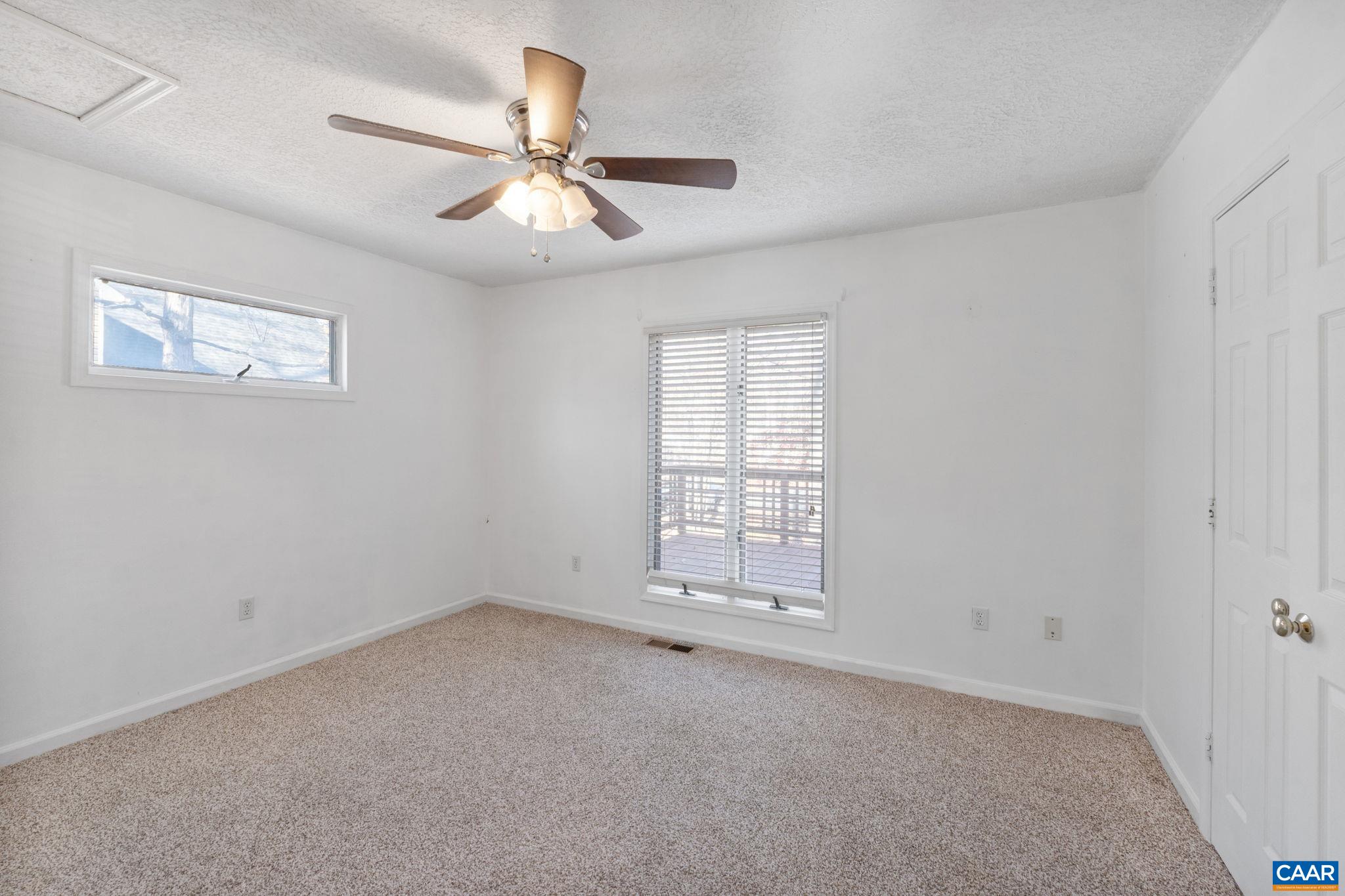30 Colonial Road Palmyra, VA 22963 - Photo 19 of 30 an empty room with windows and fan