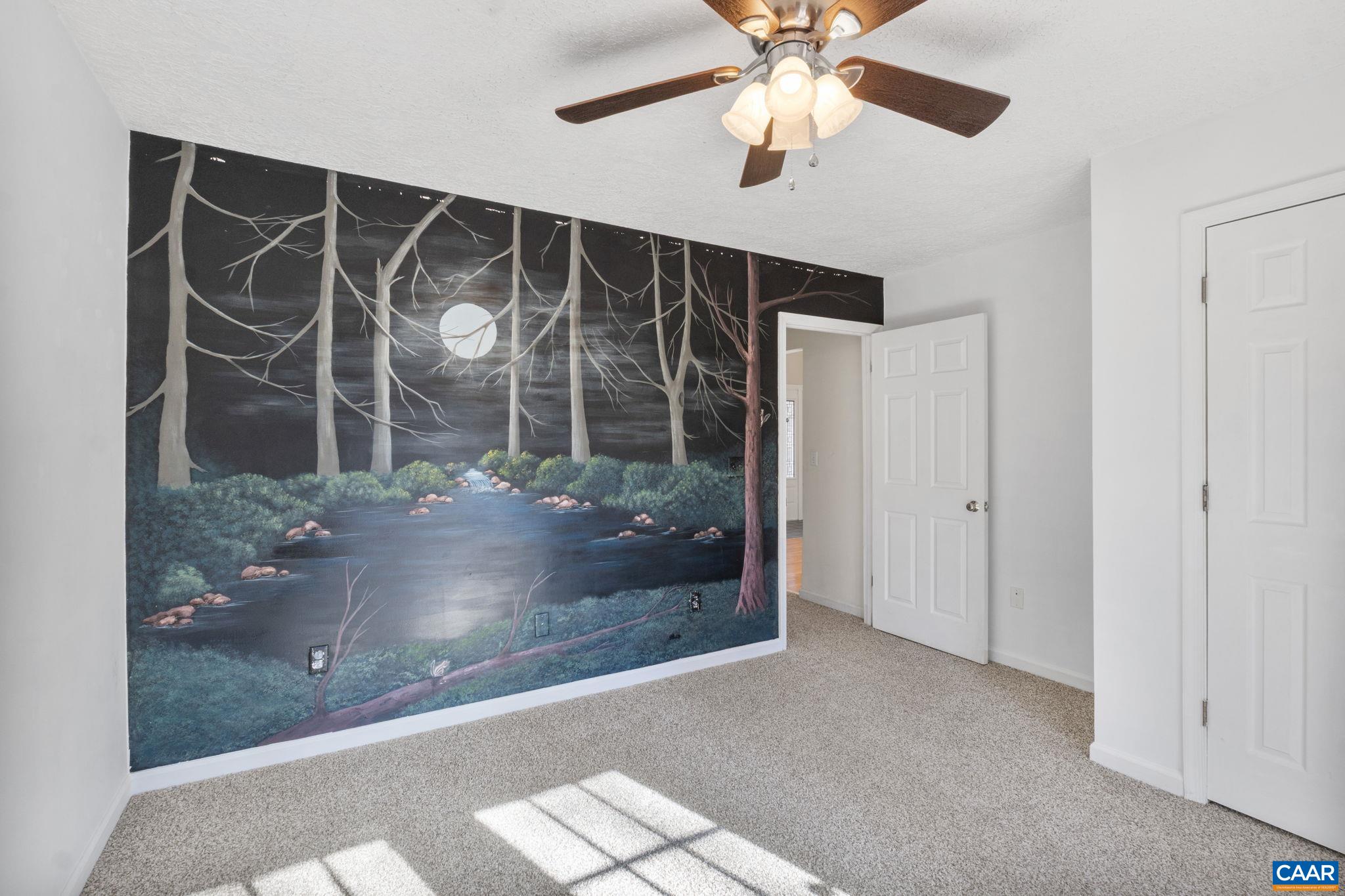 30 Colonial Road Palmyra, VA 22963 - Photo 20 of 30 a view of a glass door with a glass door and a chandelier fan