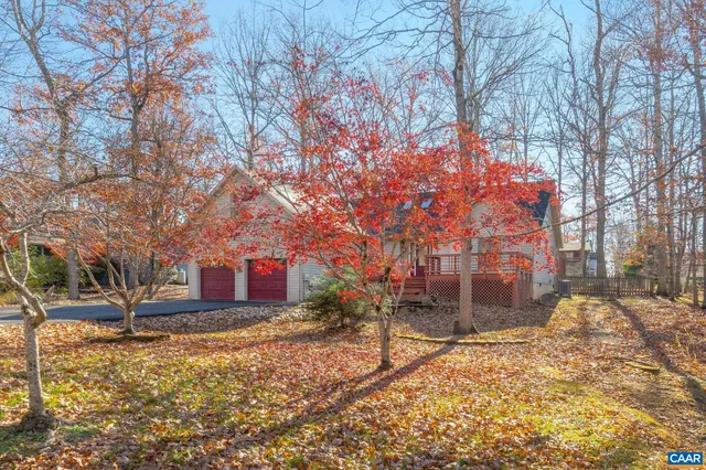 a view of road with snow on the roadside