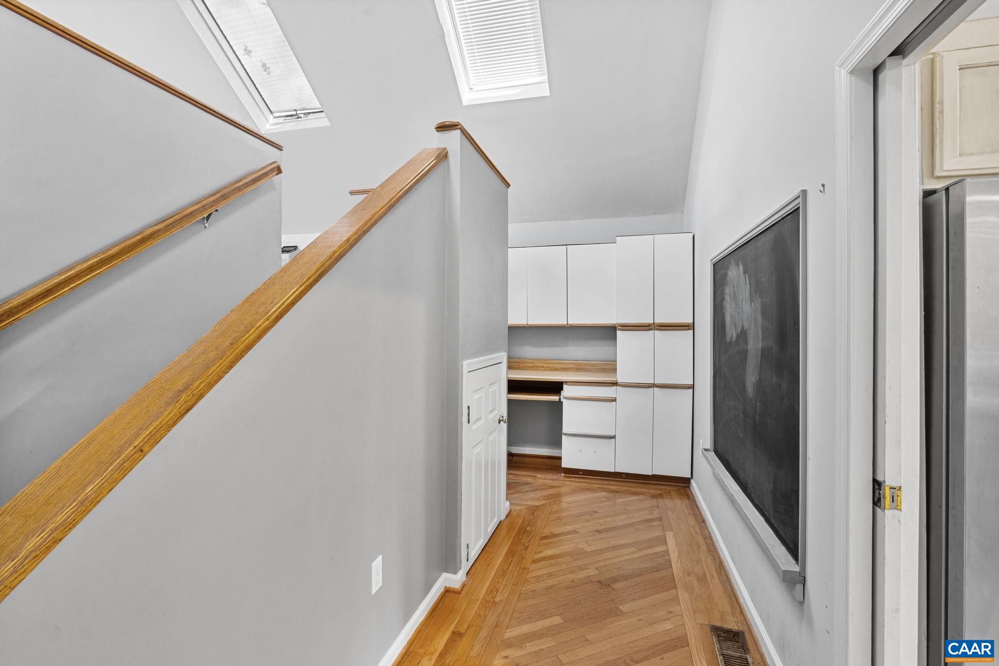 30 Colonial Road Palmyra, VA 22963 - Photo 24 of 30 a kitchen with a refrigerator and white cabinets