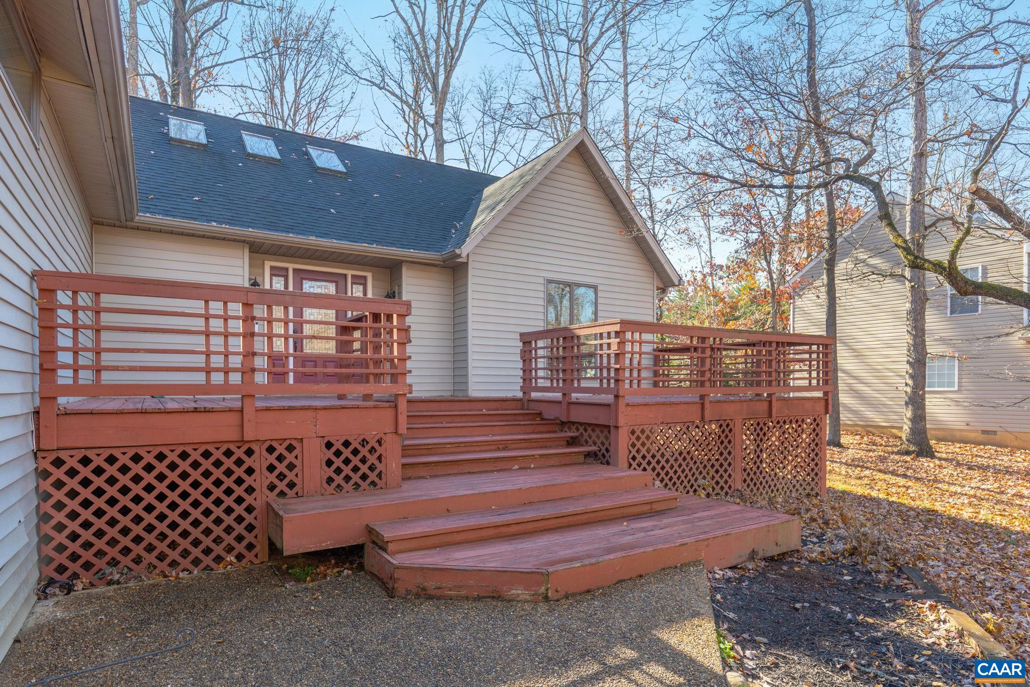 30 Colonial Road Palmyra, VA 22963 - Photo 25 of 30 a view of a deck with couches and wooden fence