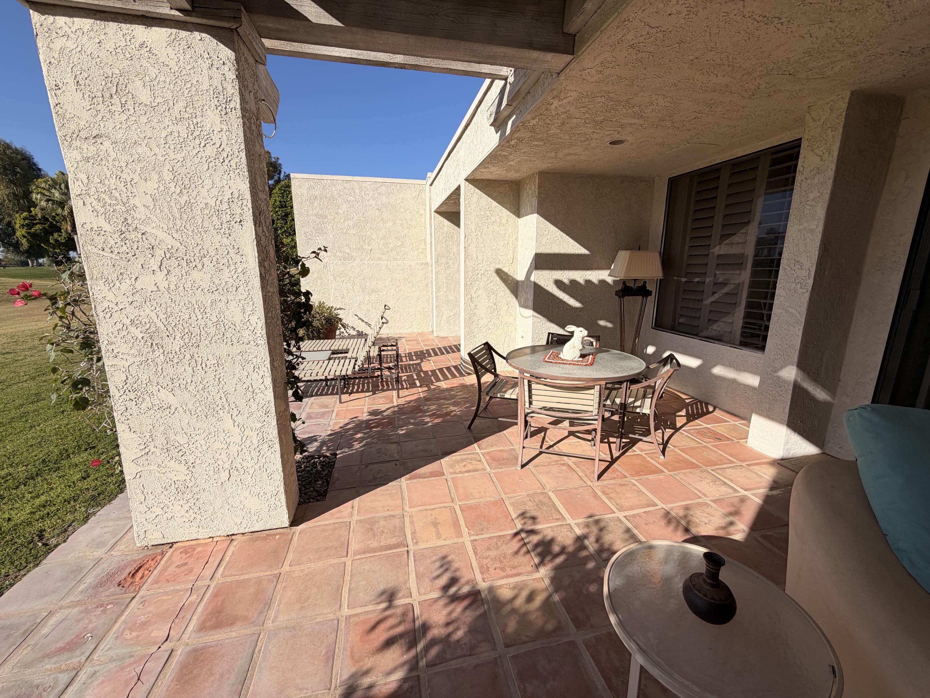 714 Inverness Drive Rancho Mirage, CA 92270 - Photo 14 of 16 a building outdoor space with patio furniture