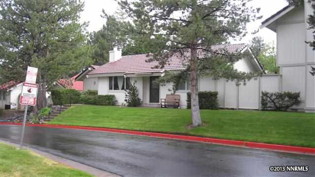 1264 Conway Lane Reno, NV 89503 - Photo 1 of 1 a front view of a house with a yard and garage
