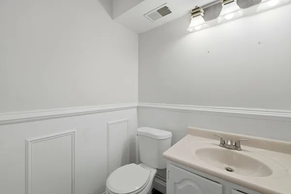 a bathroom with a sink and toilet