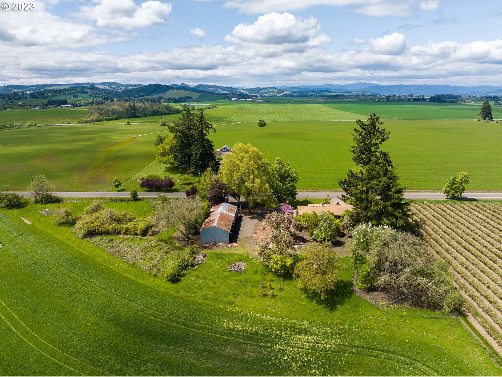 6300 Southwest Minter Bridge Road Hillsboro, OR 97123 - Photo 6 of 32 a view of a garden with an ocean view