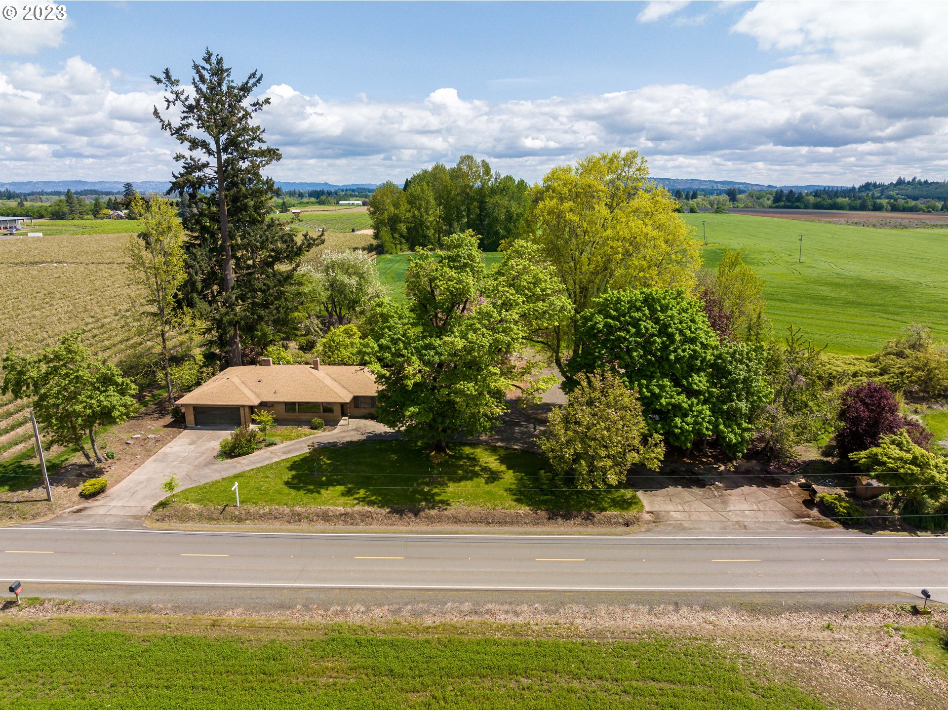 6300 Southwest Minter Bridge Road Hillsboro, OR 97123 - Photo 9 of 32 a view of a lake with a house