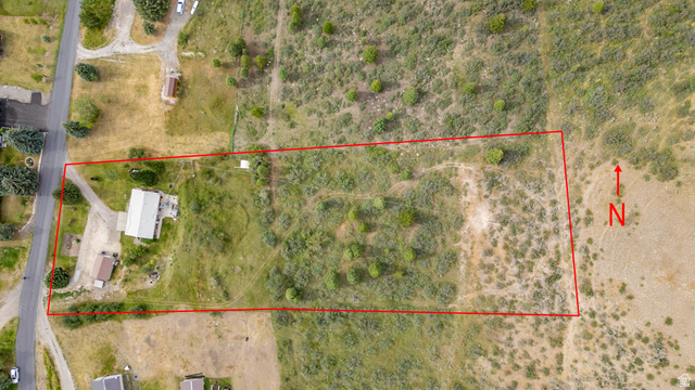 322 Bailey Creek Road Soda Springs, ID 83276 - Photo 23 of 32 Aerial depiction of a substantial land parcel, featuring a single-story residence and an auxiliary building