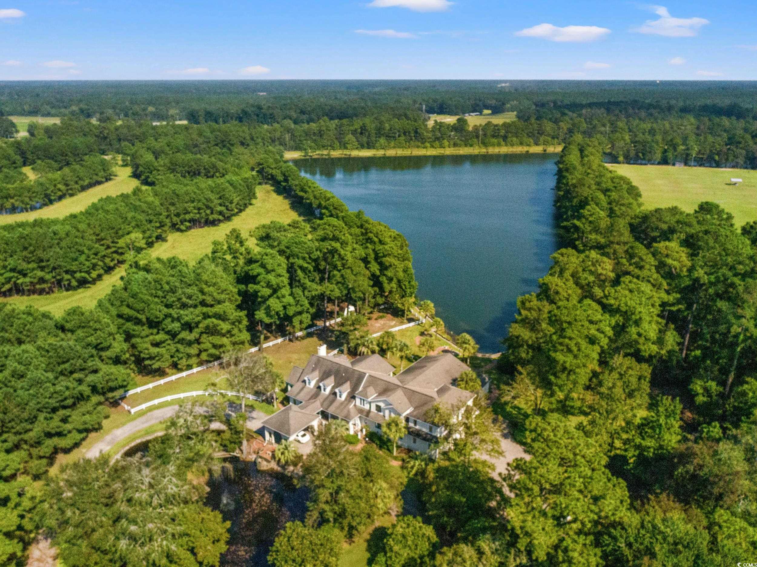 2790 Fowler Road Loris, SC 29569 - Photo 40 of 40 View of property location featuring a forest and a large body of water