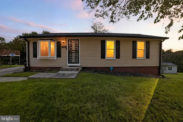 a view front of house with a yard