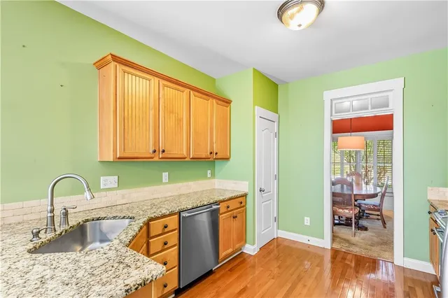 a view of an empty room with a fireplace