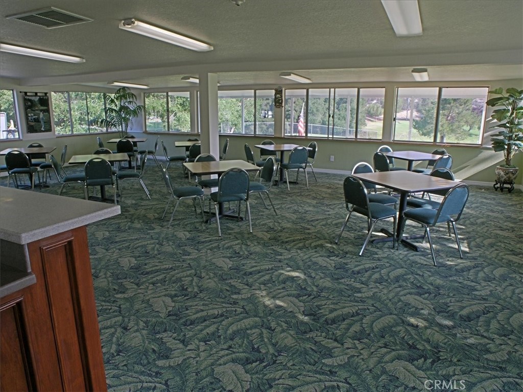 19334 Oak Crossing Road Newhall, CA 91321 - Photo 27 of 36 a view of a dining room with furniture window and outside view