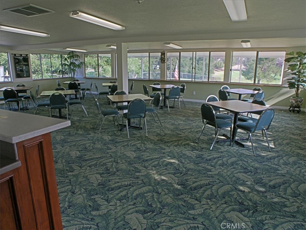 19334 Oak Crossing Road Newhall, CA 91321 - Photo 27 of 36 a view of a dining room with furniture window and outside view