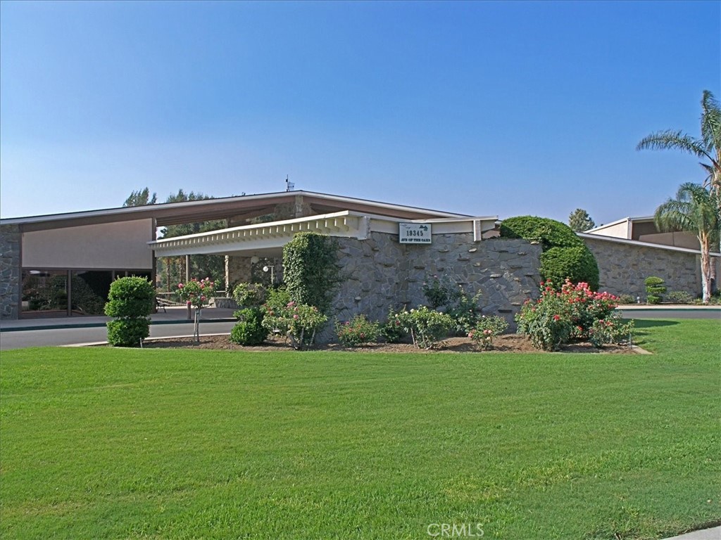 19334 Oak Crossing Road Newhall, CA 91321 - Photo 29 of 36 a view of a house with backyard sitting area and garden