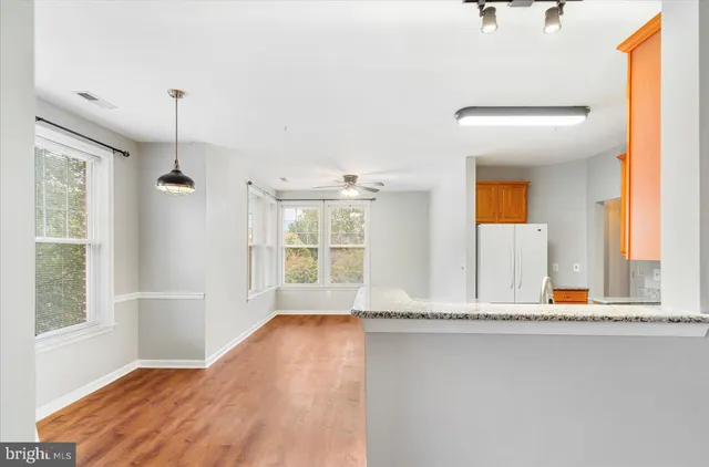 a view of a living room and a window