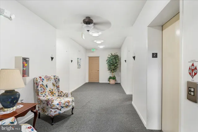 a view of a livingroom with furniture