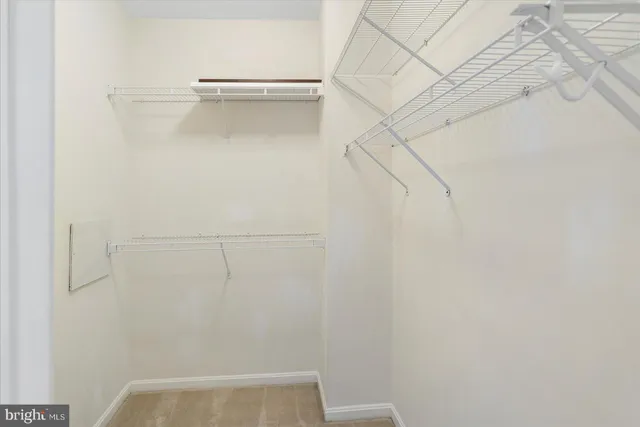 a view of small space with racks on the wall