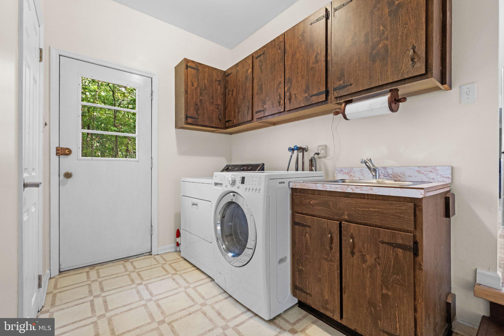 131 Heath Road Medford, NJ 08055 - Photo 22 of 55 Laundry Room with Powder Room and Rear Entrance