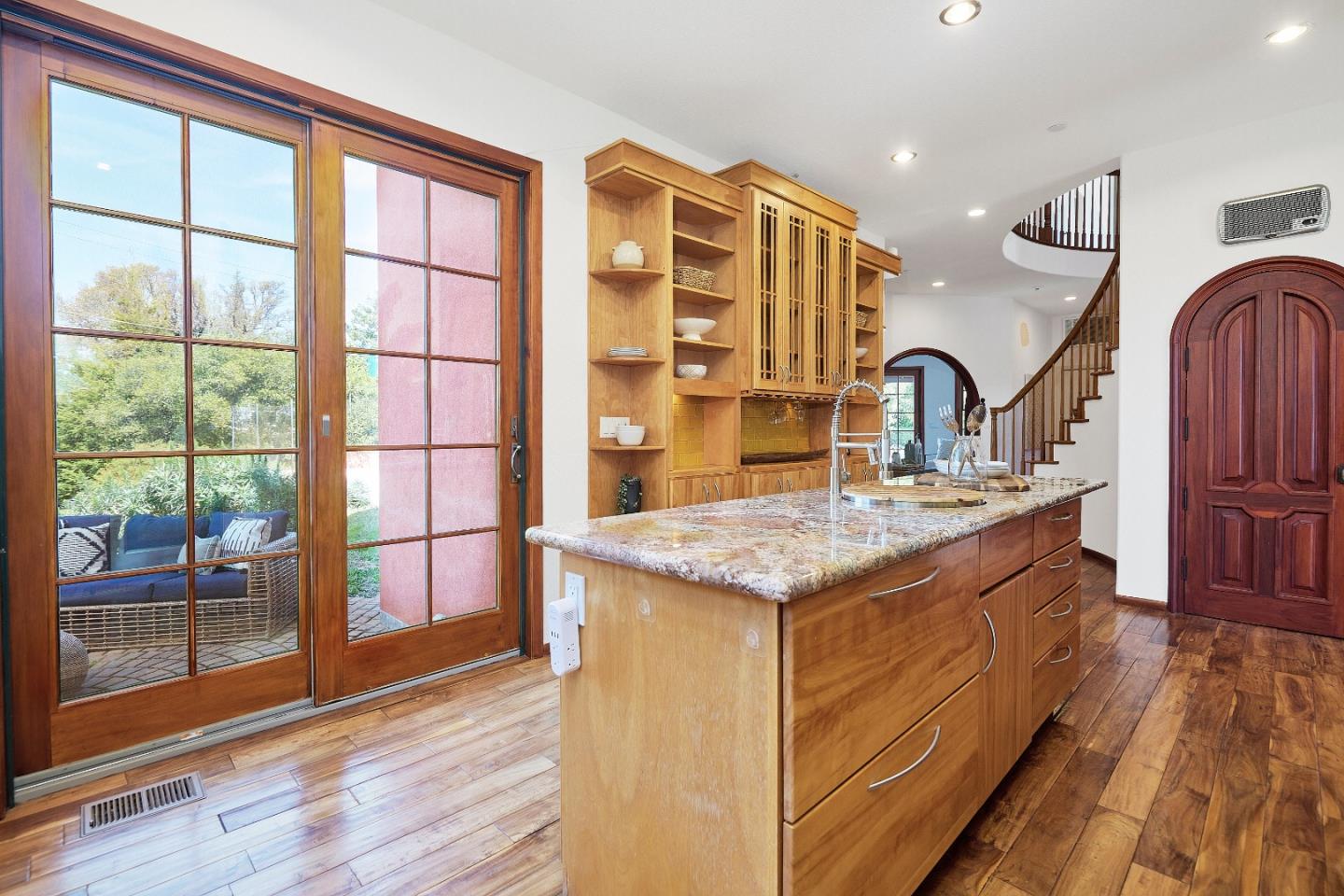 17035 Bohlman Road Saratoga, CA 95070 - Photo 12 of 27 a kitchen with a sink and a refrigerator