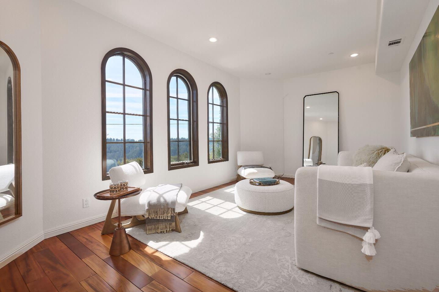 17035 Bohlman Road Saratoga, CA 95070 - Photo 6 of 27 a lobby with furniture and wooden floor