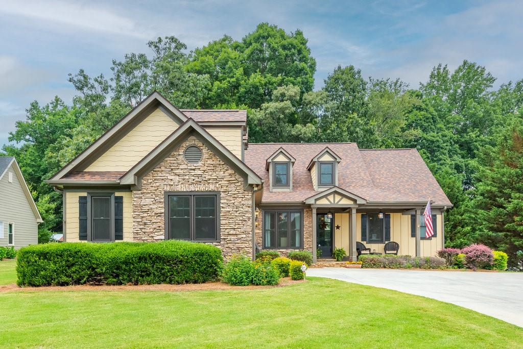 8544 Belton Bridge Road Lula, GA 30554 - Photo 1 of 1 a front view of a house with a yard