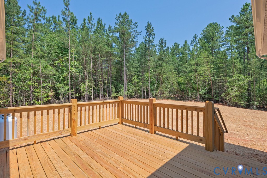2223 Ridge Road Arvonia, VA 23004 - Photo 39 of 45 Expansive wood deck with natural wood railing, int
