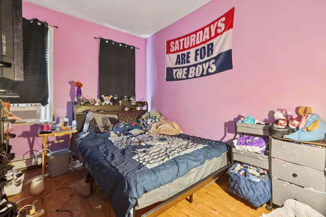 a bed room with a bed and a couch