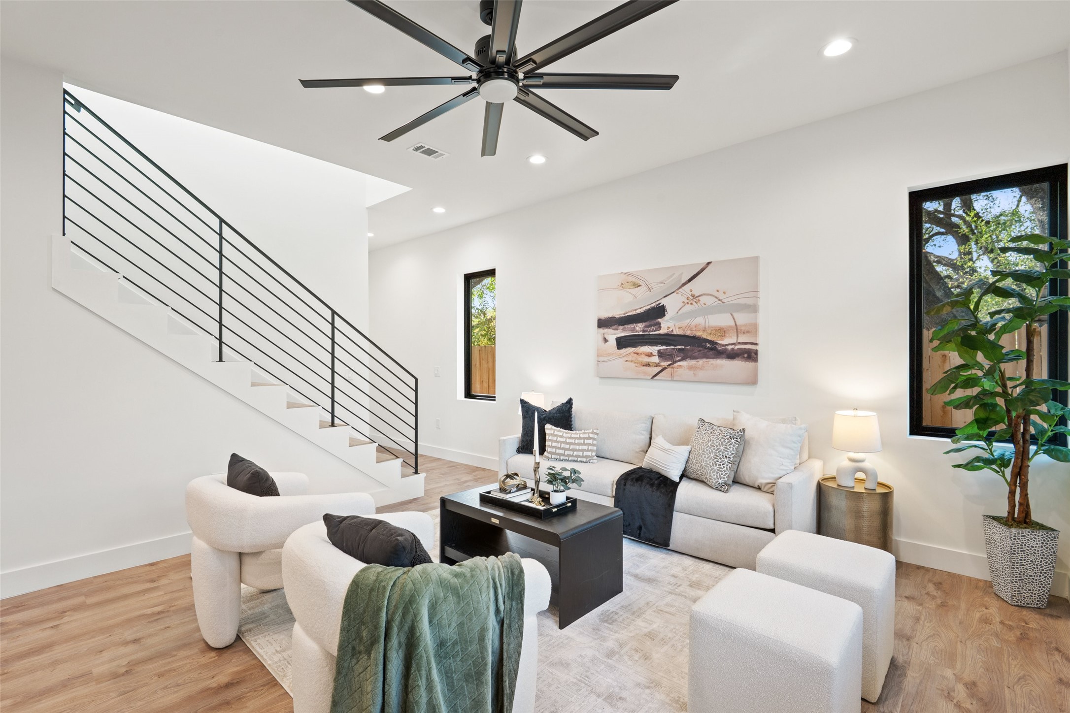 4407 Merle Drive, Unit A Austin, TX 78745 - Photo 16 of 37 a living room with furniture and a large window