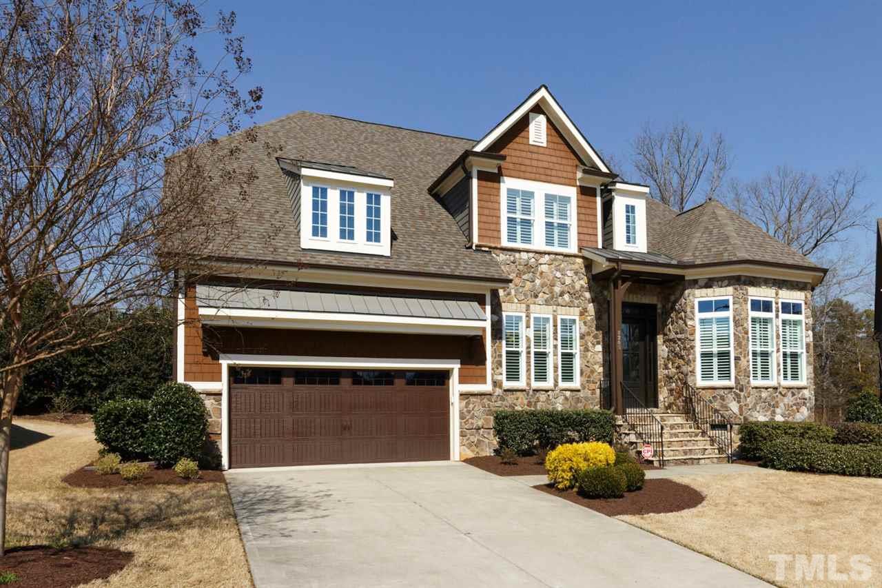 8205 Cranes View Place East Raleigh, NC 27615 - Photo 2 of 30 a front view of a house with a yard