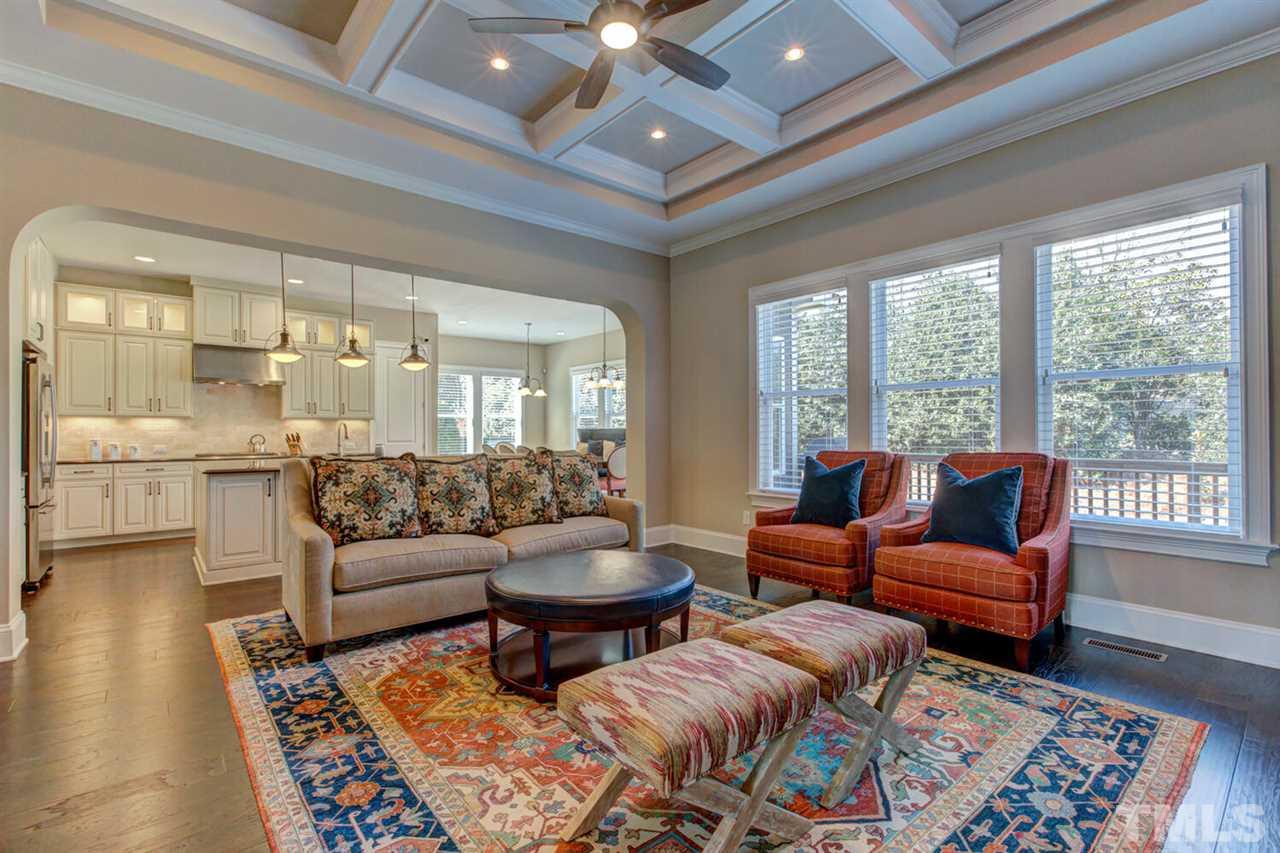 8205 Cranes View Place East Raleigh, NC 27615 - Photo 17 of 30 a living room with furniture and a large window