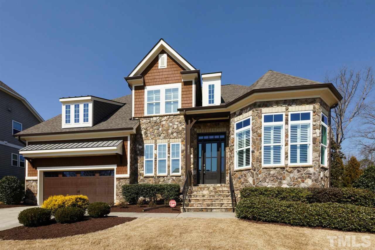 8205 Cranes View Place East Raleigh, NC 27615 - Photo 3 of 30 a front view of a house with a yard