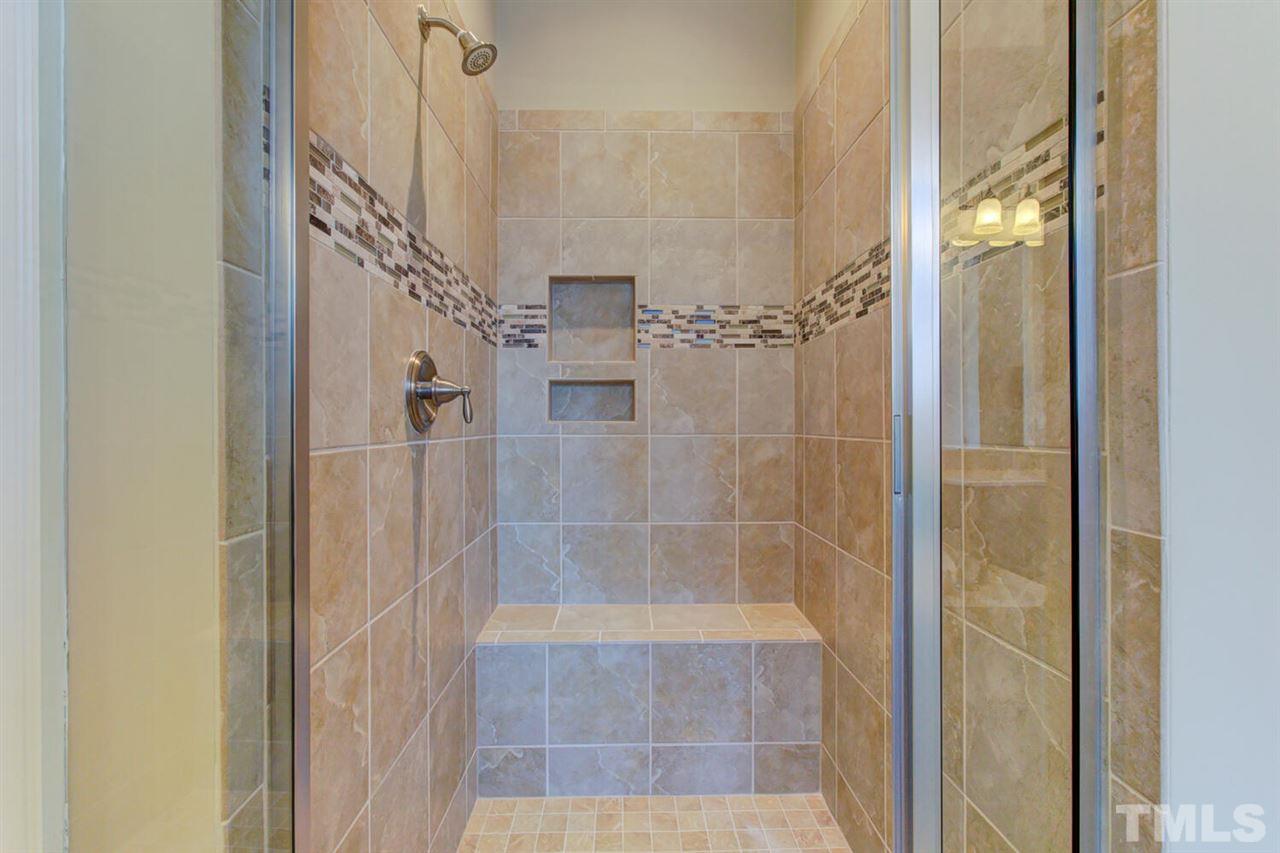 8205 Cranes View Place East Raleigh, NC 27615 - Photo 25 of 30 a bathroom with a shower