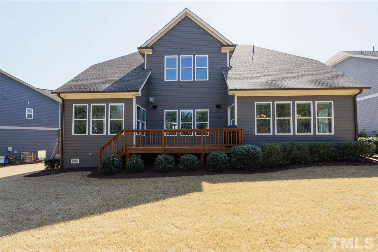 8205 Cranes View Place East Raleigh, NC 27615 - Photo 30 of 30 a front view of a house with a yard and garage