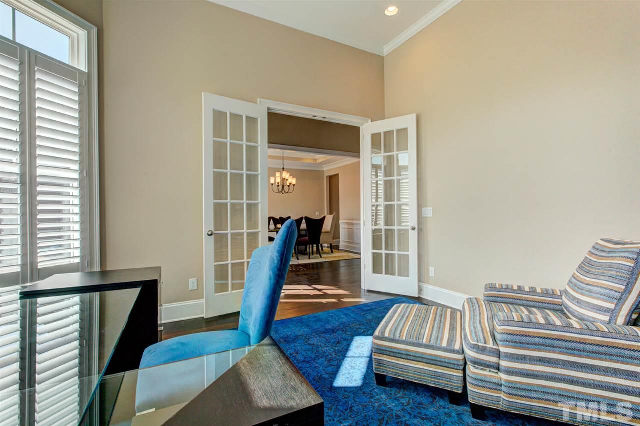 8205 Cranes View Place East Raleigh, NC 27615 - Photo 10 of 30 a living room with furniture and a wooden floor