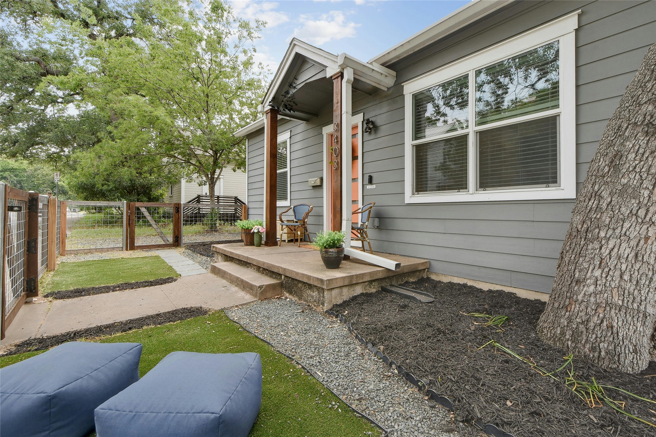 3403 King Street Austin, TX 78705 - Photo 3 of 29 a front view of a house with garden and patio