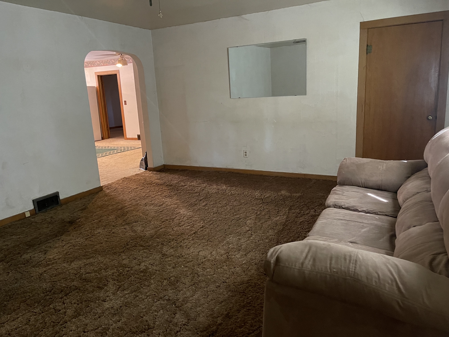 202 South Pleasant Street Rutland, IL 61358 - Photo 12 of 13 a living room with furniture and a wooden floor