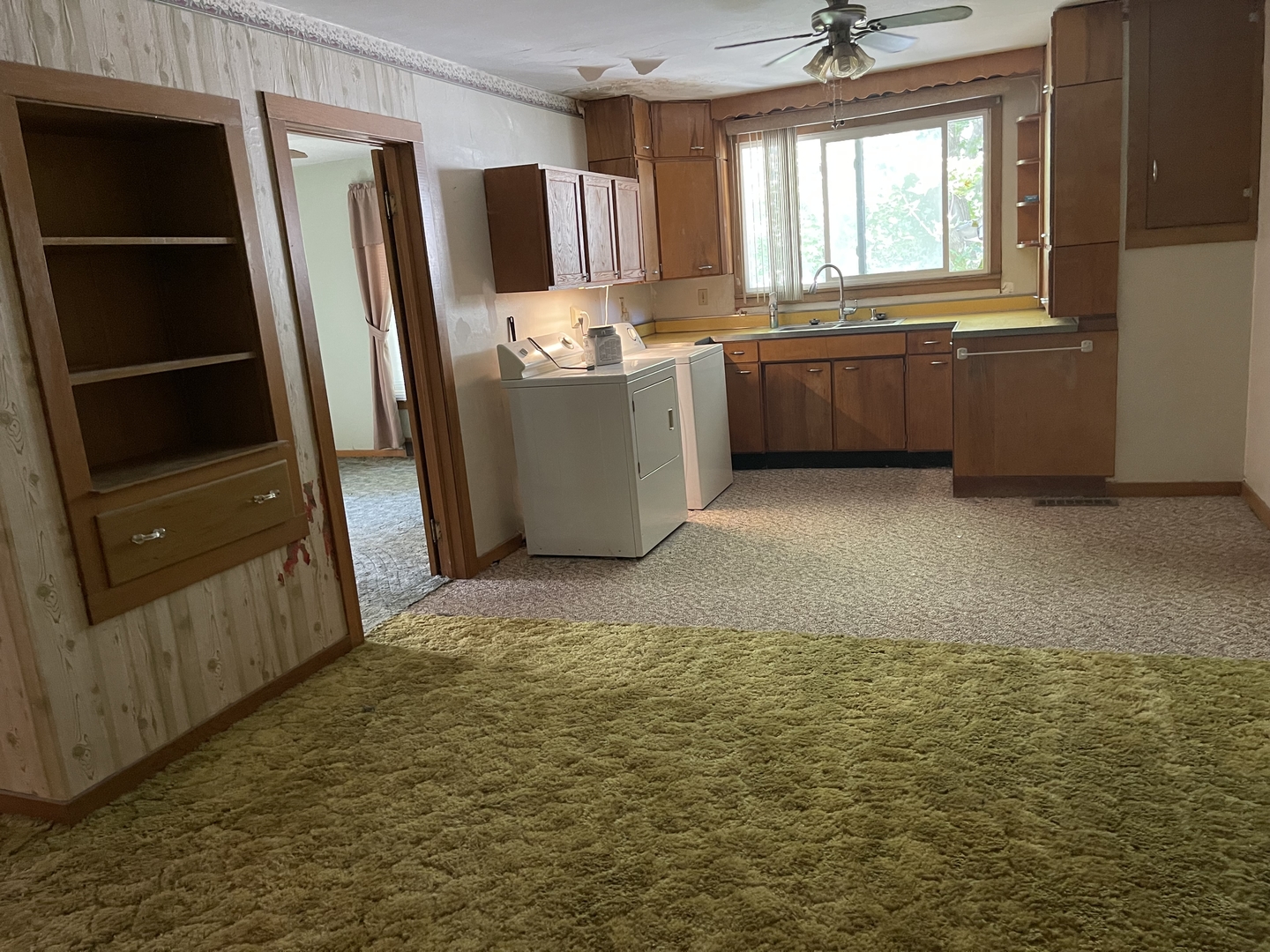 202 South Pleasant Street Rutland, IL 61358 - Photo 6 of 13 a view of a kitchen with refrigerator and window