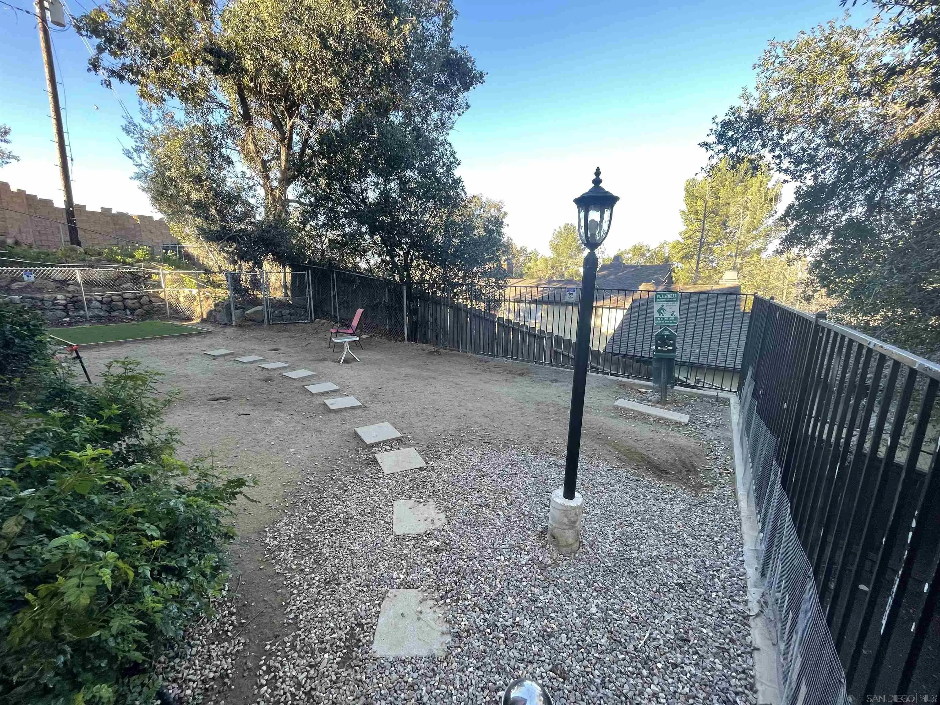 1434 Marshall Road, Unit 56 Alpine, CA 91901 - Photo 13 of 15 a backyard of a house with lots of green space