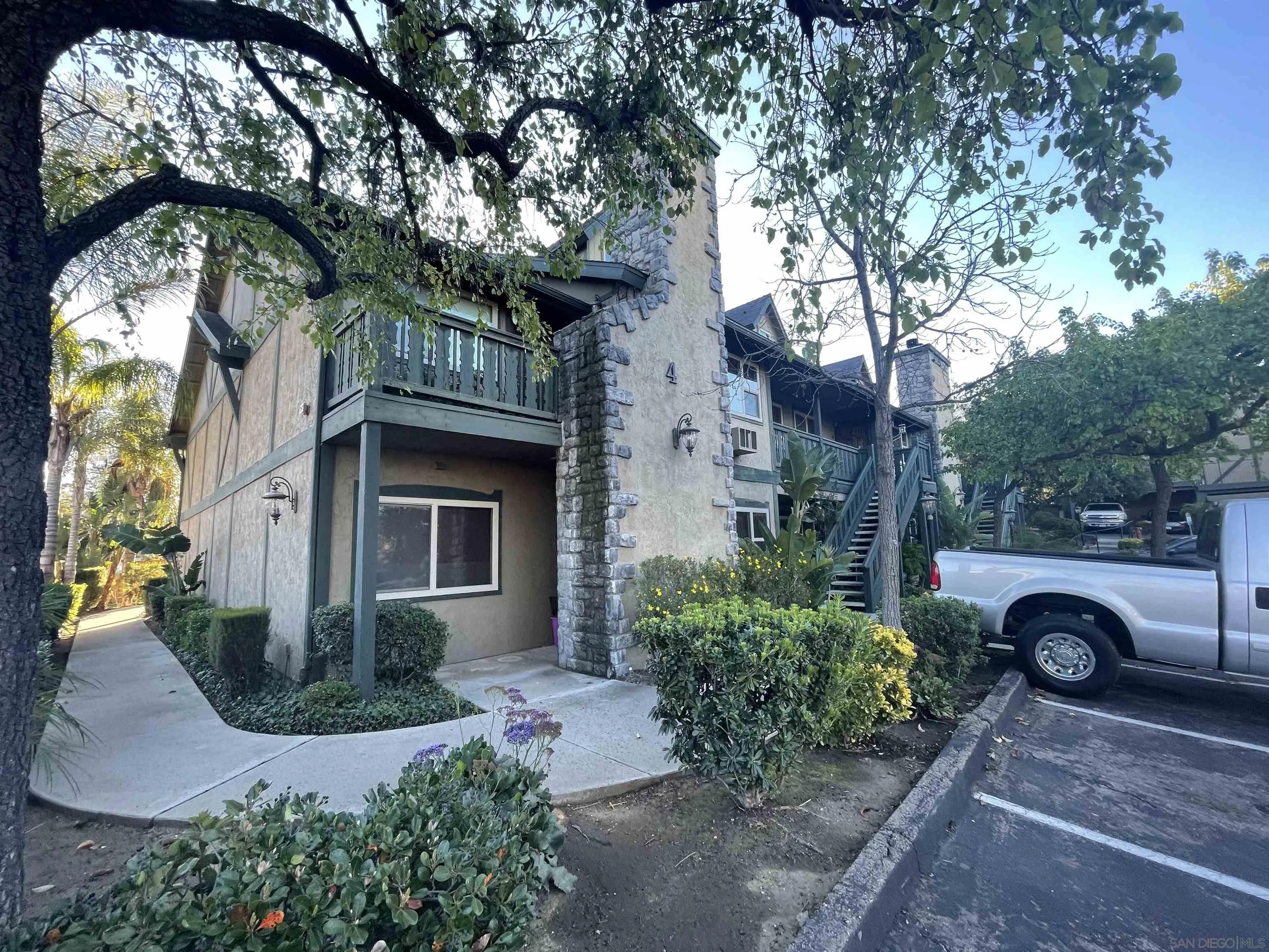 1434 Marshall Road, Unit 56 Alpine, CA 91901 - Photo 4 of 15 a front view of a house with garden