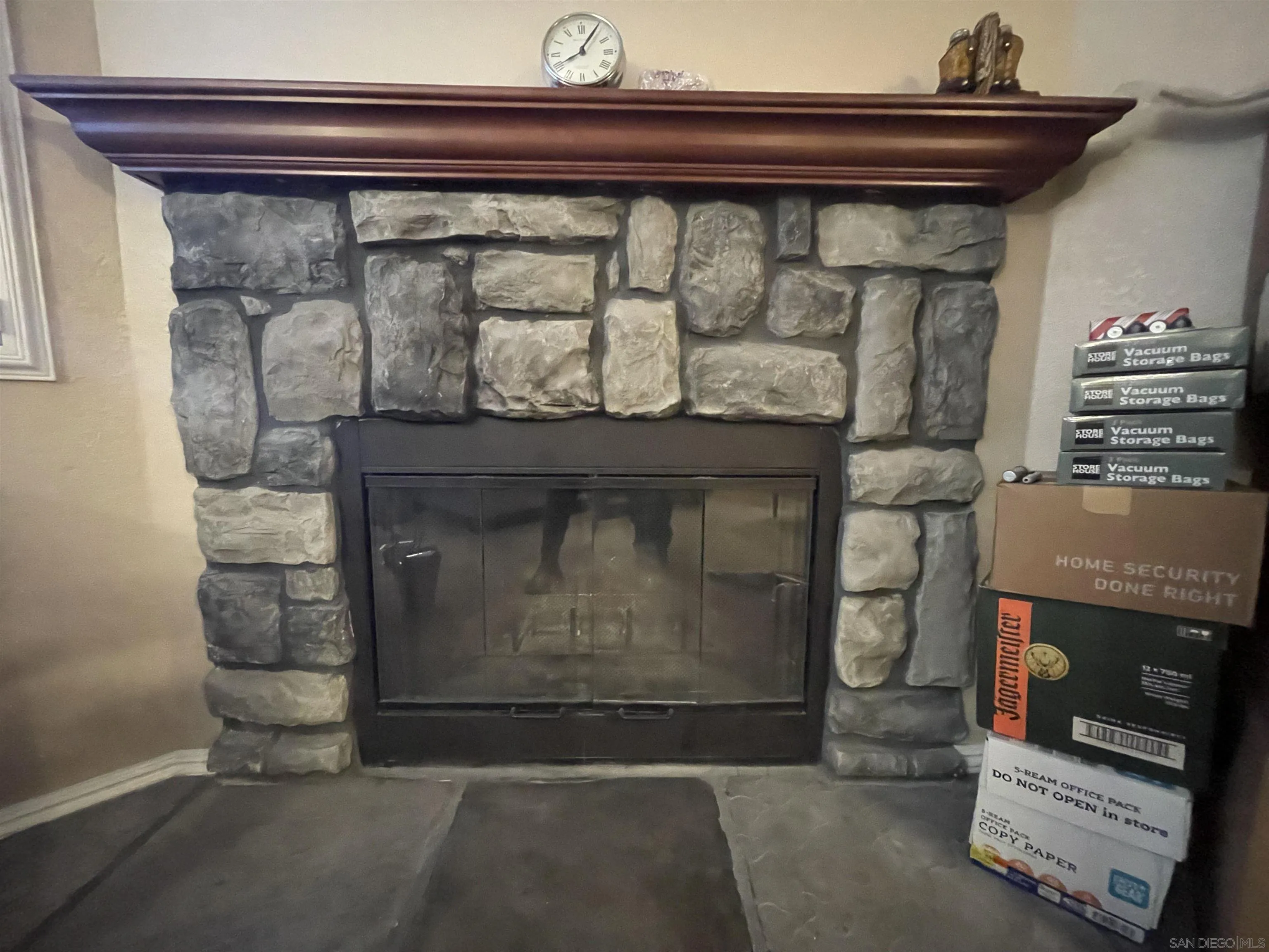 1434 Marshall Road, Unit 56 Alpine, CA 91901 - Photo 10 of 15 a closeup of a fireplace with a wooden floor