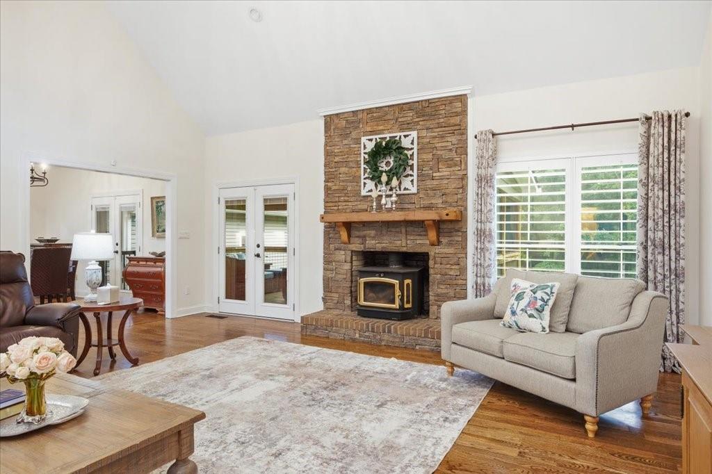 397 Thomas Road Dallas, GA 30132 - Photo 19 of 108 a living room with furniture and a fireplace