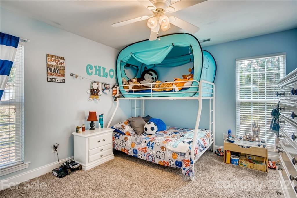 1682 Lane Road Mount Holly, NC 28120 - Photo 11 of 23 a bedroom with bed and a window
