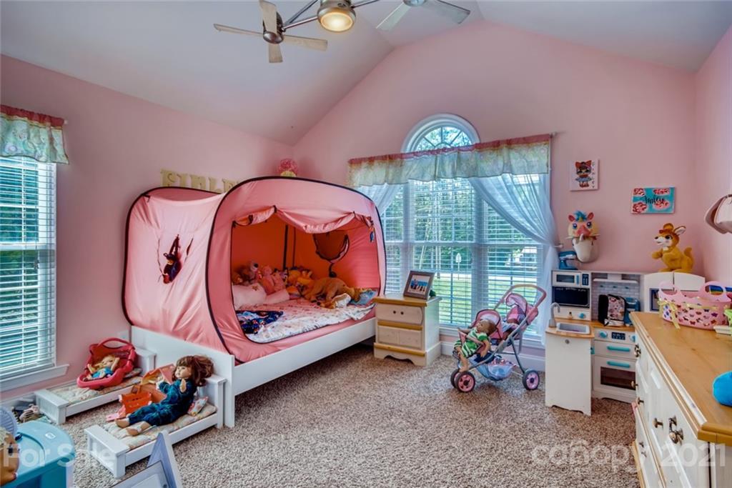 1682 Lane Road Mount Holly, NC 28120 - Photo 13 of 23 a children room with toys and a fan