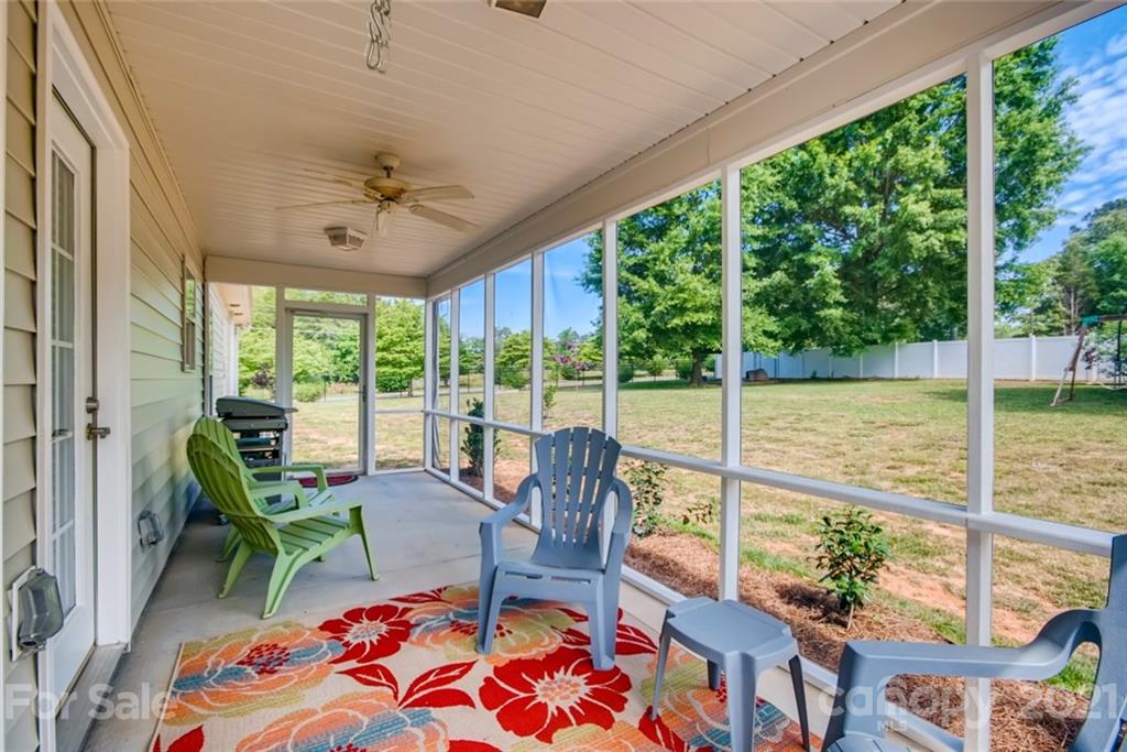 1682 Lane Road Mount Holly, NC 28120 - Photo 21 of 23 a view of a dining room with furniture window and outside view