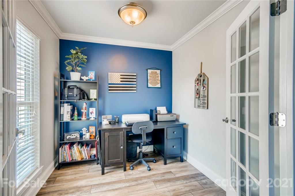 1682 Lane Road Mount Holly, NC 28120 - Photo 4 of 23 a view of a workspace with furniture and a window