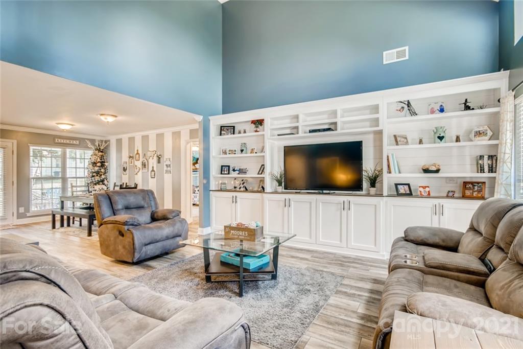 1682 Lane Road Mount Holly, NC 28120 - Photo 5 of 23 a living room with furniture and a flat screen tv