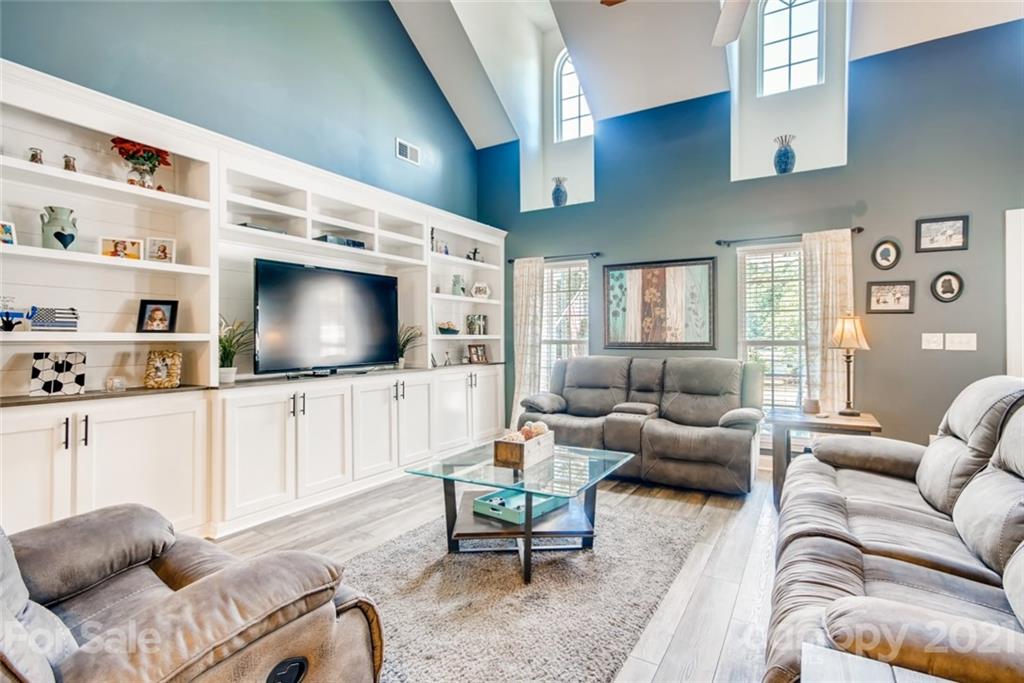 1682 Lane Road Mount Holly, NC 28120 - Photo 6 of 23 a living room with furniture and a flat screen tv