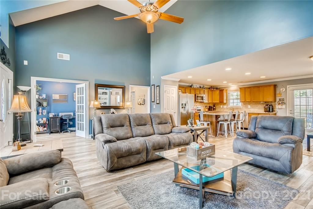 1682 Lane Road Mount Holly, NC 28120 - Photo 7 of 23 a living room with furniture and a view of kitchen