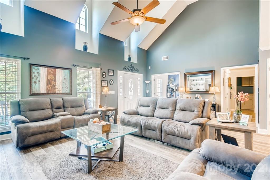 1682 Lane Road Mount Holly, NC 28120 - Photo 8 of 23 a living room with furniture and a large window